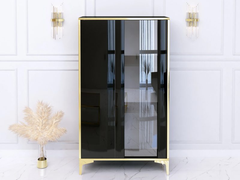 Vitrine Monako 80cm Schwarz Hochglanz mit goldenen Akzenten frontal im Wohnzimmer