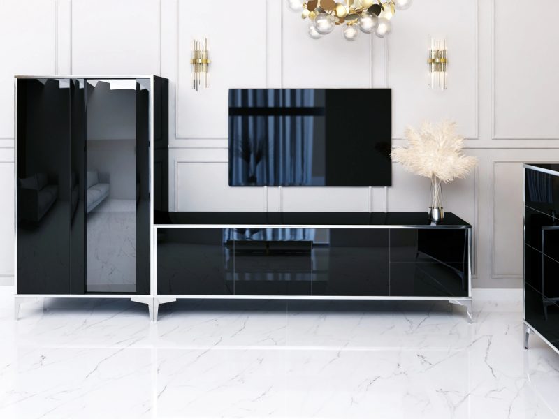 Vitrine Monako Schwarz Hochglanz kombiniert mit TV-Lowboard aus derselben Kollektion