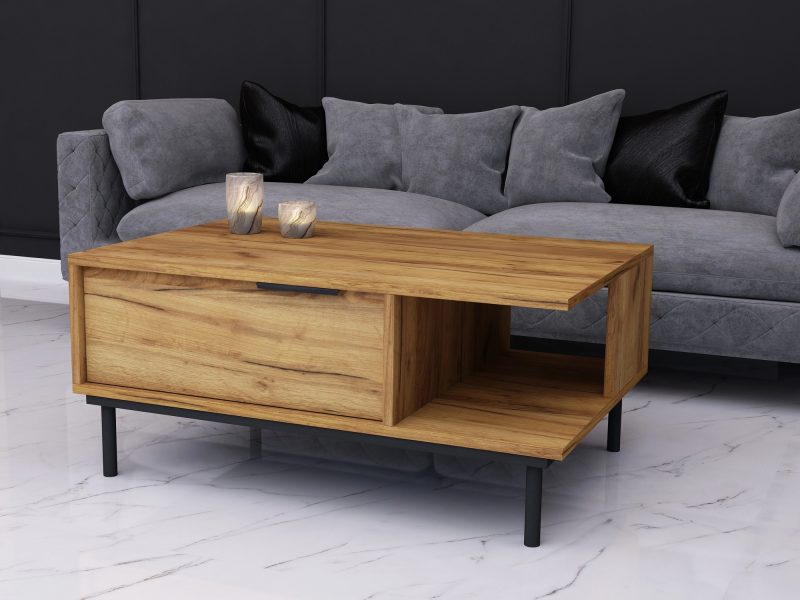 Couchtisch Cala 90×60cm Eiche Craft Gold Matt im Wohnzimmer vor grauem Sofa.