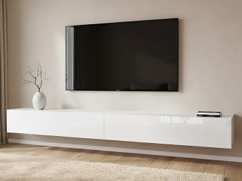Vollständig hochglänzendes weißes, schwebendes TV-Lowboard aus seitlicher Perspektive unter einem wandmontierten Fernseher.